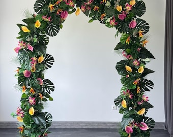 人工の熱帯植物のアレンジメント、夏のアーチ装飾、アーバー装飾、緑のアーチ、ビーチウェディングの花、シルクのセレモニー用花