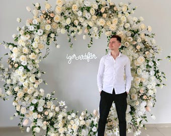 White artificial flower garland, custom floral arrangement, proposal decorations