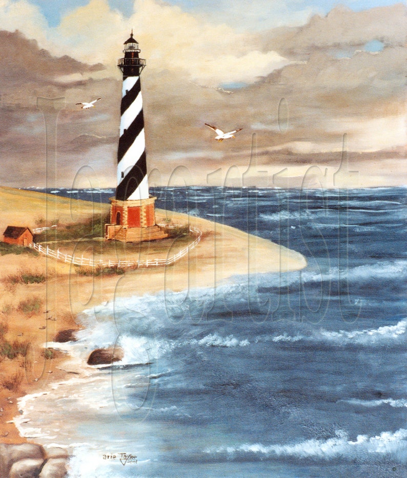May include: A painting of a black and white striped lighthouse on a sandy shore, with a small red building and white fence. The ocean waves crash against the beach, and two seagulls fly in the sky. The artwork is signed by the artist.