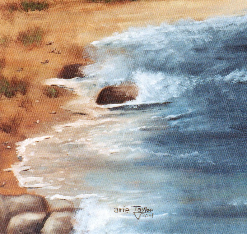 May include: An oil painting depicts a coastal scene with a sandy beach, ocean waves, and rocks. The water is a mix of blues and whites, crashing against the shore. The sand is a warm tan color. The artist's signature and the year 2001 are visible in the lower right corner.