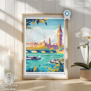 May include: A colorful cross stitch pattern of the London skyline featuring the London Eye, Big Ben, and the Houses of Parliament. The pattern is framed and hanging on a wall.