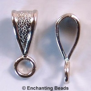 May include: Two silver-colored pendant bails. One bail has a textured, triangular top with a small loop at the bottom. The other bail is a simple teardrop shape with a small loop. The bails are for jewelry making.