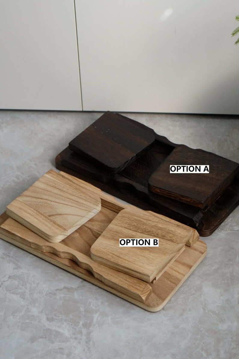 May include: Two wooden serving trays, one dark brown and one light brown, each with a square coaster. The dark brown tray has a matching coaster and the text "OPTION A". The light brown tray has a matching coaster and the text "OPTION B".