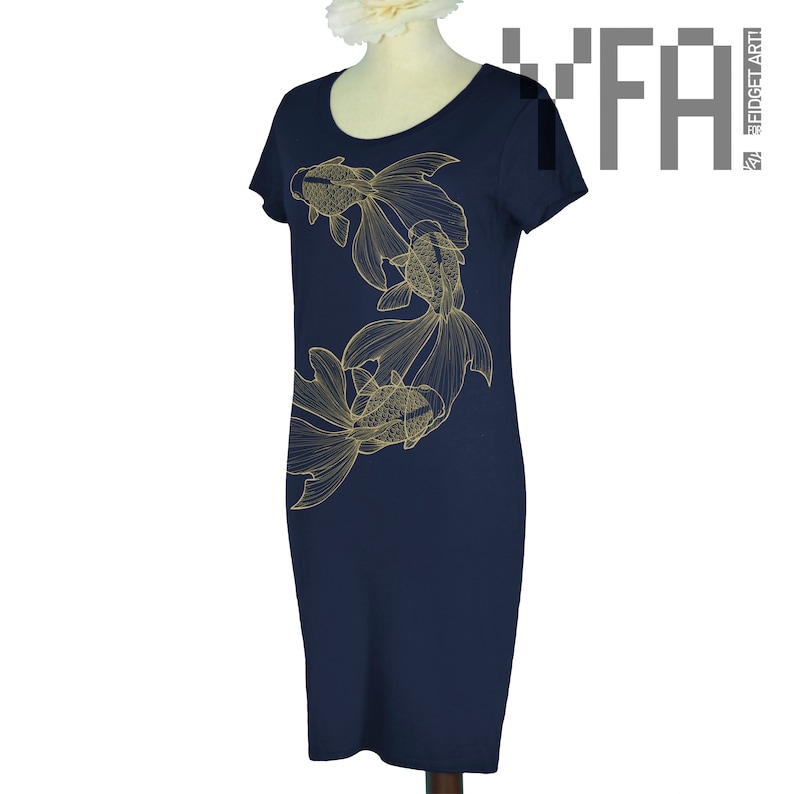 May include: A navy blue dress with a gold outline of three goldfish on the front. The dress has short sleeves and a scoop neck.