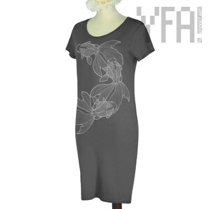 May include: A charcoal gray t-shirt dress with a white outline of three goldfish swimming in a circle on the front.