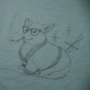 May include: A black and white illustration of a dog wearing glasses and a robe, smoking a pipe. The dog is surrounded by stars.