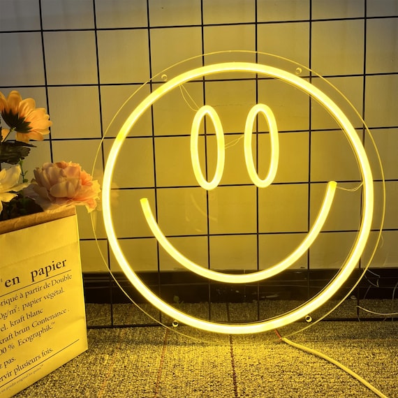 Insegna al neon con faccina sorridente che si scioglie: decorazione da parete a LED - Italia