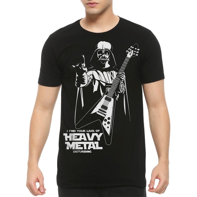 May include: Black t-shirt with a white graphic of Darth Vader playing a guitar with the text "I find your lack of Heavy Metal Disturbing."