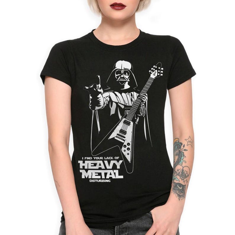 May include: Black t-shirt featuring a white illustration of Darth Vader playing an electric guitar with the text "I find your lack of Heavy Metal disturbing."