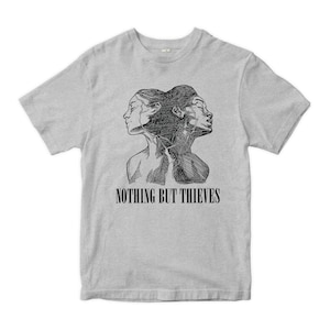 May include: A light gray t-shirt featuring a black and white illustration of two faces merged together. The text "NOTHING BUT THIEVES" is printed in black below the illustration.