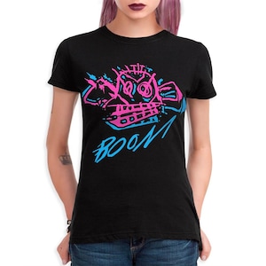 May include: Black t-shirt with a pink and blue graphic of a robot with the word "BOOM" underneath.