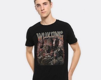 May include: Black t-shirt with a graphic print of a group of monkeys with the word "WUKONG" in red and yellow letters.