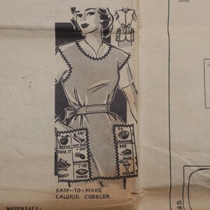 May include: Vintage black and white illustration of a woman wearing an apron, with a detailed diagram of the apron's design. The apron has a scalloped edge and a bow at the waist. The text "EASY-TO-MAKE CALORIE COBBLER" is visible.