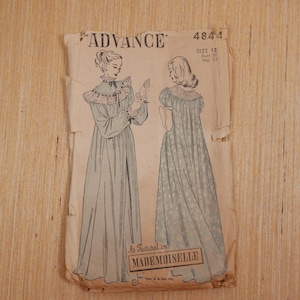 May include: A vintage Advance 4844 sewing pattern envelope for a floor-length gown in size 12, featuring a bust of 30 inches and hip of 33 inches. The illustration shows two views of a long-sleeved dress with a ruffled collar and floral print.