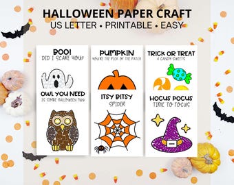 May include: Printable Halloween paper craft activity sheets with a ghost, pumpkin, spider, and witch hat. Each sheet has a Halloween-themed phrase and instructions to create a craft using small items like beads or buttons.
