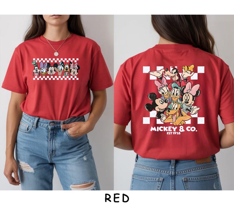 May include: A red t-shirt featuring a front graphic of Disney characters in a row over a white and red checkerboard pattern. The back displays a larger group of Disney characters over a checkerboard square with the text MICKEY & CO. EST 1928.