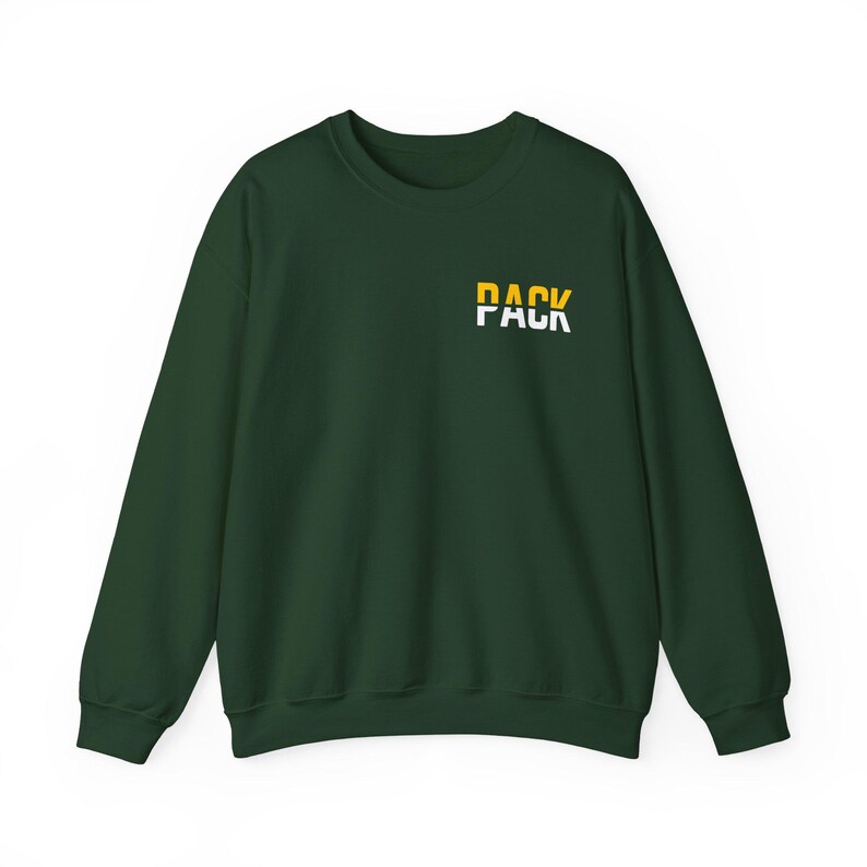 May include: A dark green sweatshirt with the word "PACK" printed on the front in white and yellow letters.