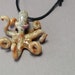 see more listings in the Octopus Pendant section