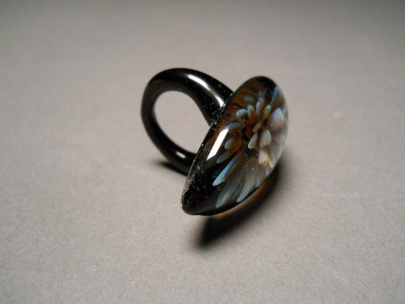 Hand made blown Glass Ring with implosion flower using Etsy