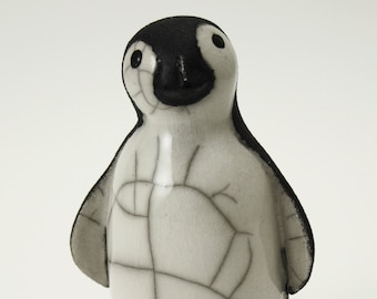 Penguin chick looking forward - ceramic raku fired sculpture