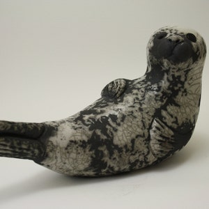 Seal Lying on Back - Raku fired ceramic sculpture coastal beach