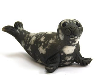 Seal pup on Flippers - Raku fired ceramic sculpture