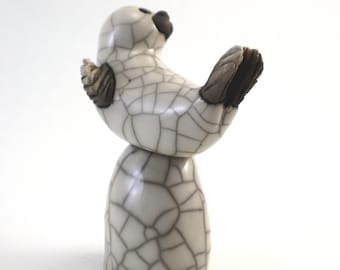 Seal on rock - ceramic raku fired pottery animal sculpture seaside beach figurine