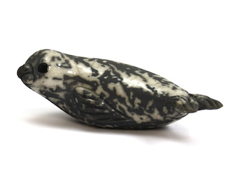 Seal pup on Belly - Raku fired ceramic sculpture