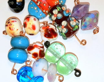 9 pairs of handmade lampwork beads!