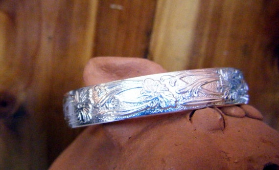 Wide Flowered Sterling Silver Baby Bracelet for a Newborn Baby or One Year Old