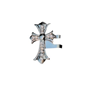 May include: A silver-colored cross pendant with a decorative design. The cross features multiple clear, round gemstones and a detailed, ornate shape. The pendant is set against a plain white background.