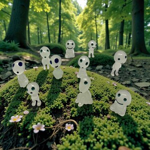 Add a playful yet calming touch to your plant decor with this Kodama tree spirit figurine. Inspired by mystical forest guardians, it fits beautifully into pots, shelves, and mini garden displays. Its simple white design pairs perfectly with greenery, making it a charming plant buddy and a unique gift for houseplant lovers, gardeners, and fans of folklore-inspired decor.