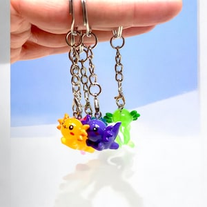 Brighten up someone’s day with this cute axolotl keychain! Compact enough for any pocket or purse, this little amphibian friend makes every key ring more fun. It’s a thoughtful, affordable gift idea for students, coworkers, or anyone who adores cute animals and creative accessories that stand out from the crowd.
