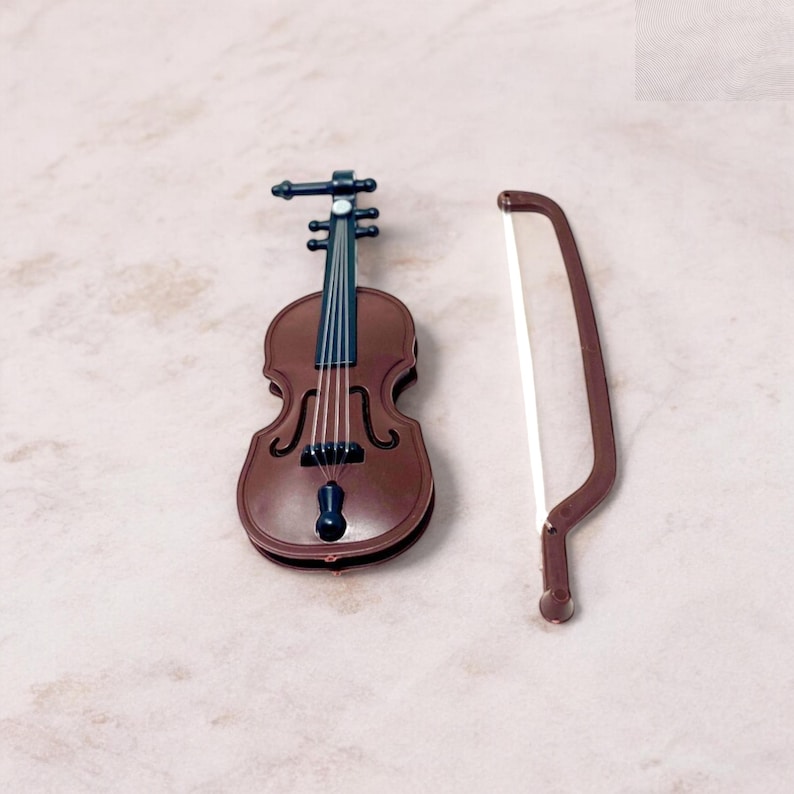 Add a dose of humor to life’s smallest problems with this tiny violin gag gift. Designed for laughs, it’s a clever desk accessory and a guaranteed conversation starter. Compact and easy to carry, it’s perfect for prank moments, office jokes, or gifting to someone who appreciates dry wit. A great choice for stocking stuffers, white elephant parties, and novelty gift lovers who enjoy a good laugh.