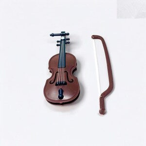 This tiny violin novelty gift is the ultimate prop for playful sarcasm. Whether it’s office drama, exaggerated stories, or first-world problems, this mini violin delivers the punchline instantly. Small, lightweight, and easy to display, it makes a hilarious gift for coworkers, bosses, friends, or family. Great for birthdays, Secret Santa, desk décor, and gag gift exchanges that call for humor with perfect timing.