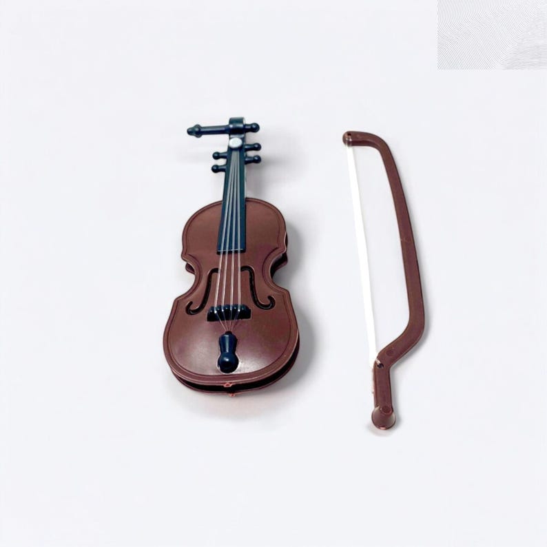 This tiny violin novelty gift is the ultimate prop for playful sarcasm. Whether it’s office drama, exaggerated stories, or first-world problems, this mini violin delivers the punchline instantly. Small, lightweight, and easy to display, it makes a hilarious gift for coworkers, bosses, friends, or family. Great for birthdays, Secret Santa, desk décor, and gag gift exchanges that call for humor with perfect timing.