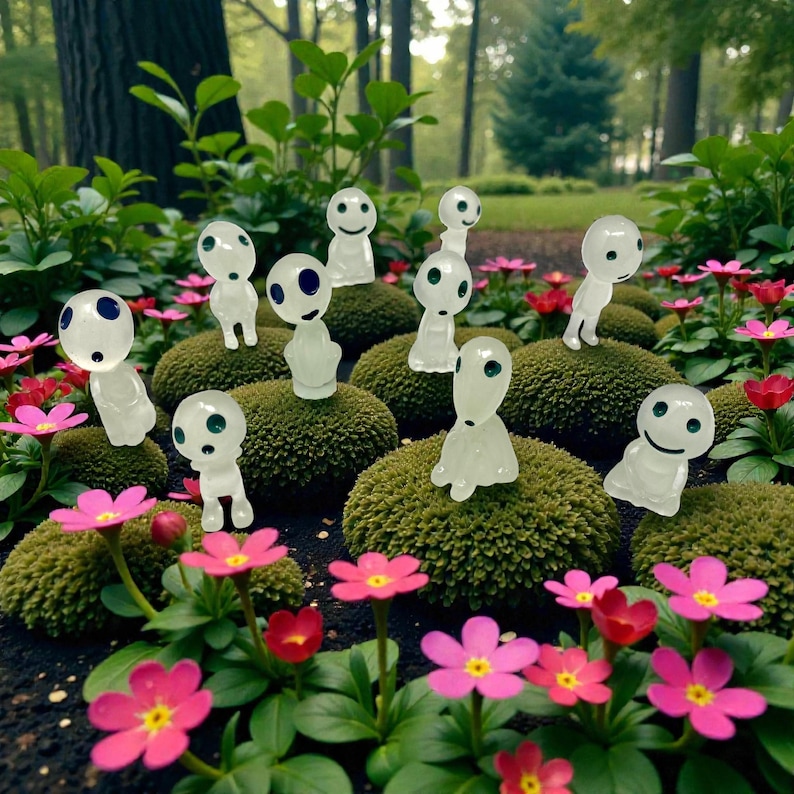 Bring forest folklore into your home with this mini Kodama Tree Spirit plant buddy. Its ghost-like white design blends beautifully with greenery while adding playful charm. Perfect for terrariums, fairy gardens, and planter decor, it makes a thoughtful gift for nature lovers, houseplant collectors, and anyone who enjoys whimsical and magical home accents.