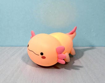 Lámpara de noche LED con forma de ajolote adorable: lámpara de animal rosa y blandita, luz de mesilla infantil con temporizador, regalo recargable de silicona con forma de ajolote.