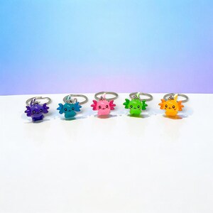 Whether you’re decorating your backpack or surprising a friend, our Mini Axolotl Keychain is the cutest companion you’ll ever carry! It’s the perfect mix of playful and practical, designed to add color and joy to your everyday life. Great for gifting or collecting—small size, big smile.