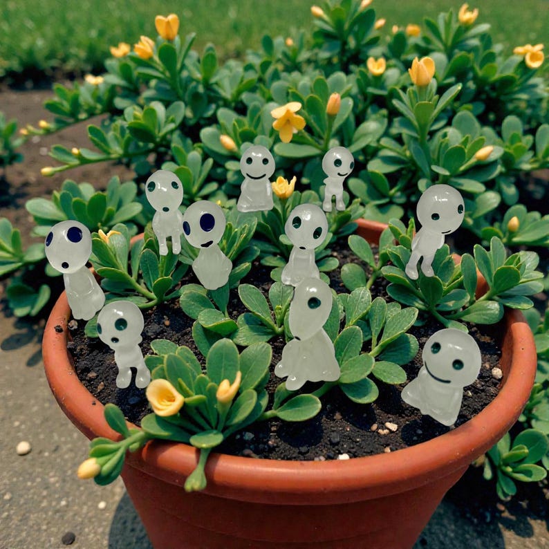 Turn ordinary planters into enchanting forest scenes with this mini Kodama Tree Spirit decor piece. These whimsical spirits symbolize harmony with nature and protection of the forest. Perfect for fairy gardens, houseplants, and terrariums, this lightweight figurine adds charm without clutter. A wonderful gift idea for plant lovers, fantasy decor fans, and anyone who enjoys magical home accents.