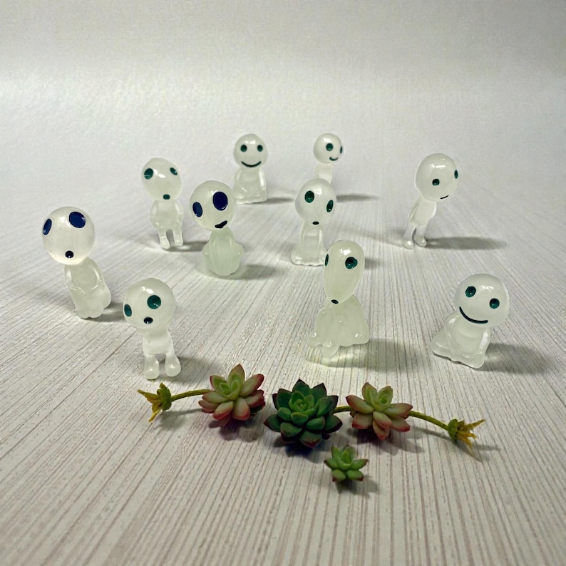 This miniature Kodama spirit brings woodland magic to your indoor plants and home decor. Designed as a plant companion, it adds personality to planters, fairy gardens, and terrariums. Inspired by Japanese folklore, these tiny guardians represent peace and nature’s beauty. A perfect decorative accent and thoughtful gift for plant parents, nature lovers, and whimsical decor collectors.