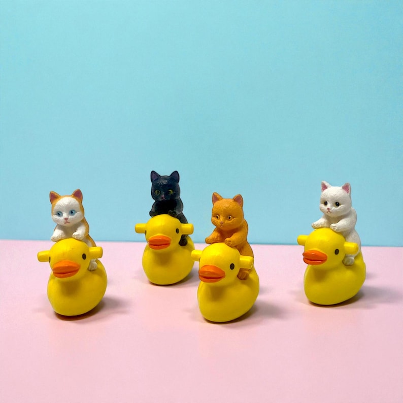 This mini cat riding a duck figurine is the ultimate quirky gift you didn’t know you needed. Handcrafted with adorable detail, it’s the perfect gag gift, funny stocking stuffer, or cute desk companion. Cat lovers and collectors adore its tiny charm, making it a standout piece for holiday gifting, office pranks, or just cheering up your space with something joyfully unexpected.