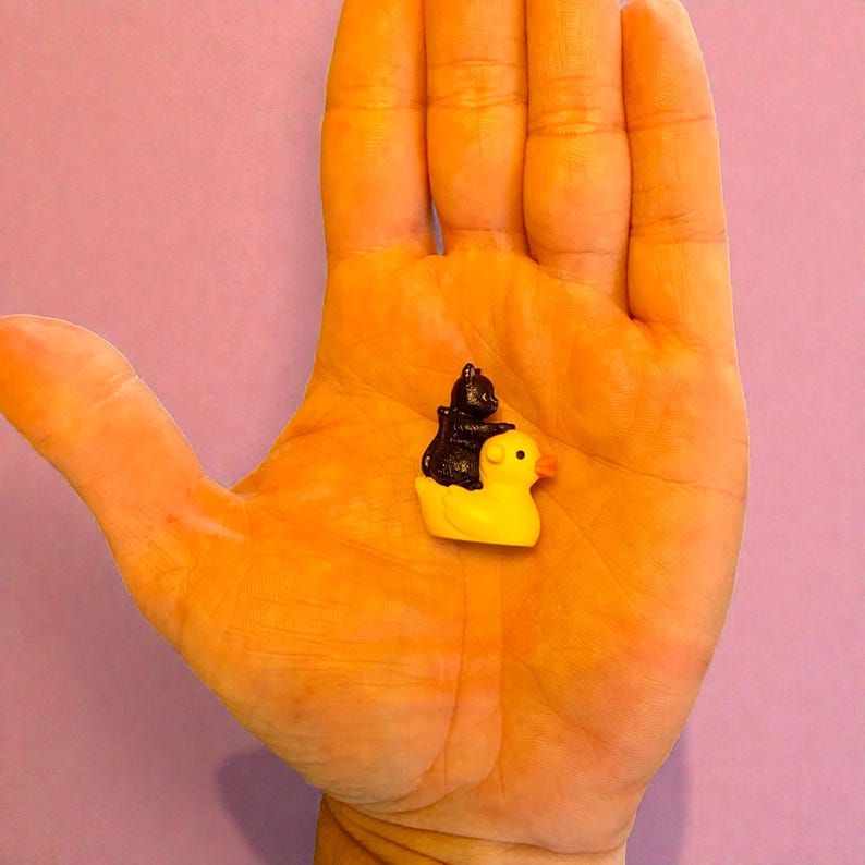 Looking for a funny miniature to brighten someone’s day? This cat riding duck figurine is handcrafted with adorable quirks, making it perfect for stocking stuffers, prank gifts, and lighthearted surprises. Its tiny size fits perfectly on desks, dashboards, and display shelves, offering daily smiles. Cat lovers and collectors treasure its unique, humorous charm.