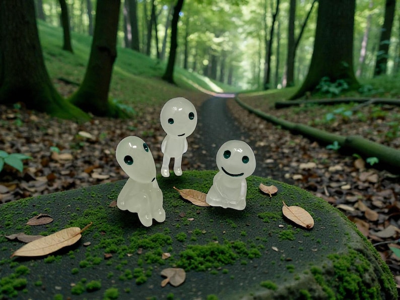 Transform your houseplants into a magical forest scene with this Kodama Tree Spirit decor piece. These legendary woodland guardians are known for protecting ancient trees and symbolizing harmony with nature. Lightweight and perfectly sized for planters, this figurine makes a wonderful plant accessory, fairy garden addition, or unique gift for anyone who loves whimsical decor and peaceful greenery.