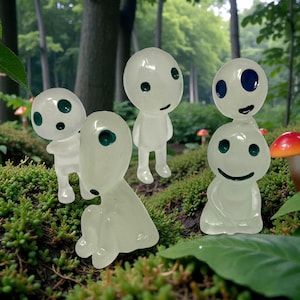 Decorate your plants with a touch of fantasy using this adorable Kodama Tree Spirit figurine. These tiny forest guardians are known for protecting ancient trees and symbolizing harmony with nature. Ideal for pots, shelves, fairy gardens, and terrariums, this charming plant buddy makes a unique gift for houseplant enthusiasts and lovers of magical, nature-inspired decor.