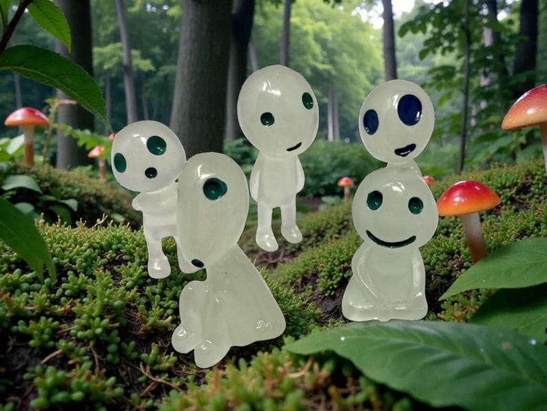Decorate your plants with a touch of fantasy using this adorable Kodama Tree Spirit figurine. These tiny forest guardians are known for protecting ancient trees and symbolizing harmony with nature. Ideal for pots, shelves, fairy gardens, and terrariums, this charming plant buddy makes a unique gift for houseplant enthusiasts and lovers of magical, nature-inspired decor.