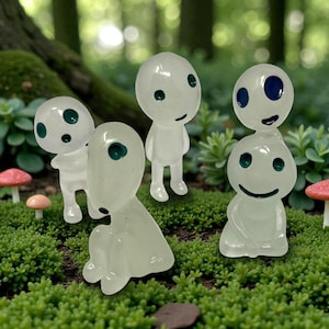 This adorable Kodama spirit plant companion is the perfect way to decorate your indoor plants with personality and charm. Inspired by mystical forest guardians of Japanese legend, this small white ghost-like figure fits easily into planters, fairy gardens, or desk spaces. A thoughtful gift for houseplant lovers, nature fans, and those who enjoy magical decor with a peaceful woodland aesthetic.