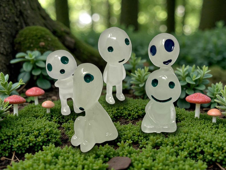 This adorable Kodama spirit plant companion is the perfect way to decorate your indoor plants with personality and charm. Inspired by mystical forest guardians of Japanese legend, this small white ghost-like figure fits easily into planters, fairy gardens, or desk spaces. A thoughtful gift for houseplant lovers, nature fans, and those who enjoy magical decor with a peaceful woodland aesthetic.