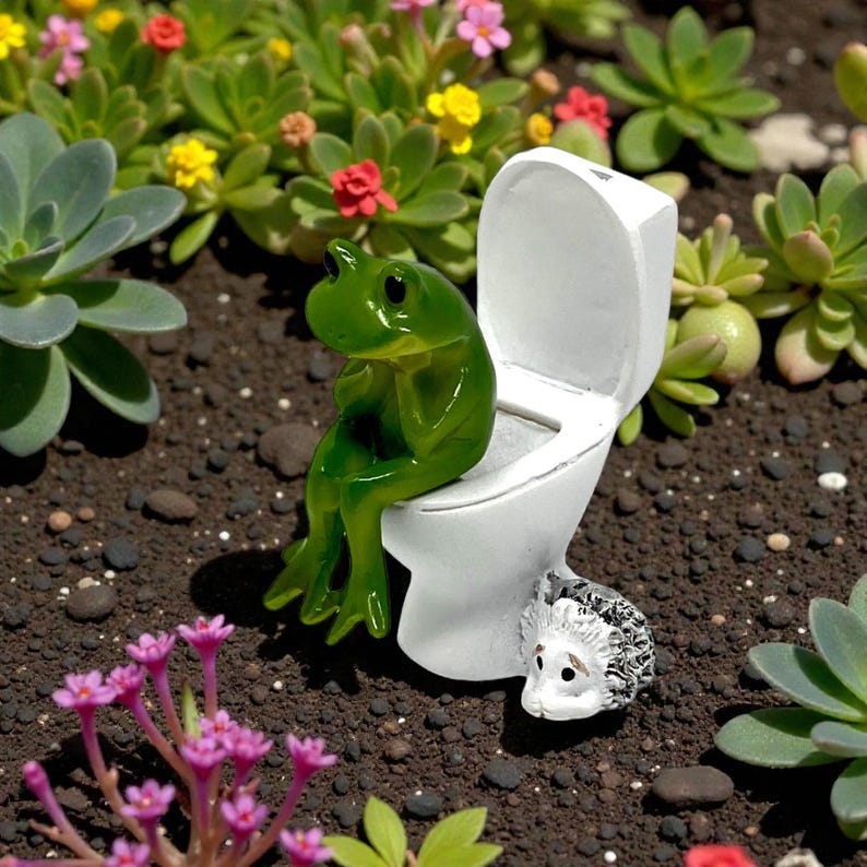 This funny frog toilet figurine is a guaranteed crowd-pleaser. Designed as playful bathroom decor and a novelty gift, it’s perfect for desks, shelves, and small spaces. Makes a great gag gift, stocking stuffer, or silly frog gift for any occasion.