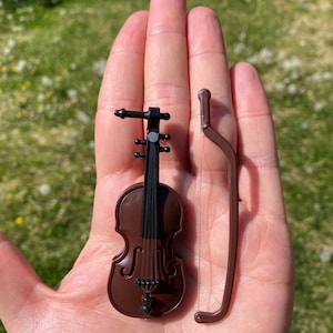 A tiny violin for life’s tiniest problems. This playful gag gift is perfect for sarcastic personalities, humor-forward offices, and anyone who appreciates clever novelty gifts. Its compact size makes it easy to display or carry for perfectly timed comedic effect. Great for coworker gifts, Secret Santa, desk décor, or party favors. It’s a lighthearted way to bring laughter into everyday moments without saying a single word.